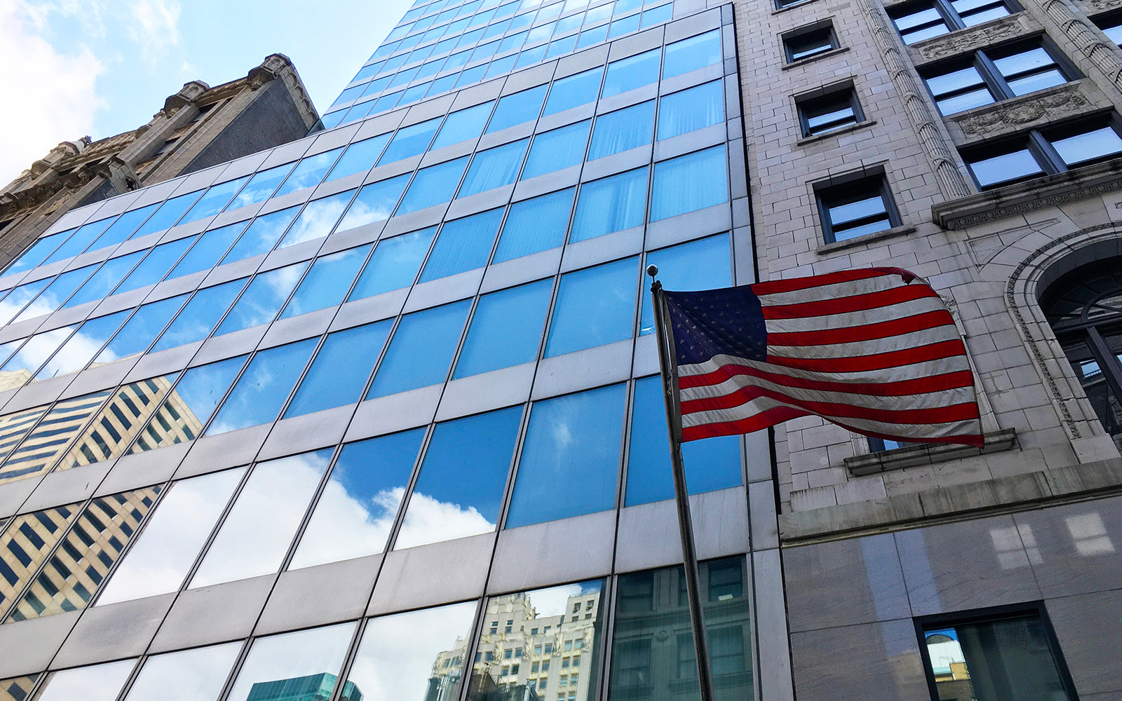 Tall office building with American flag