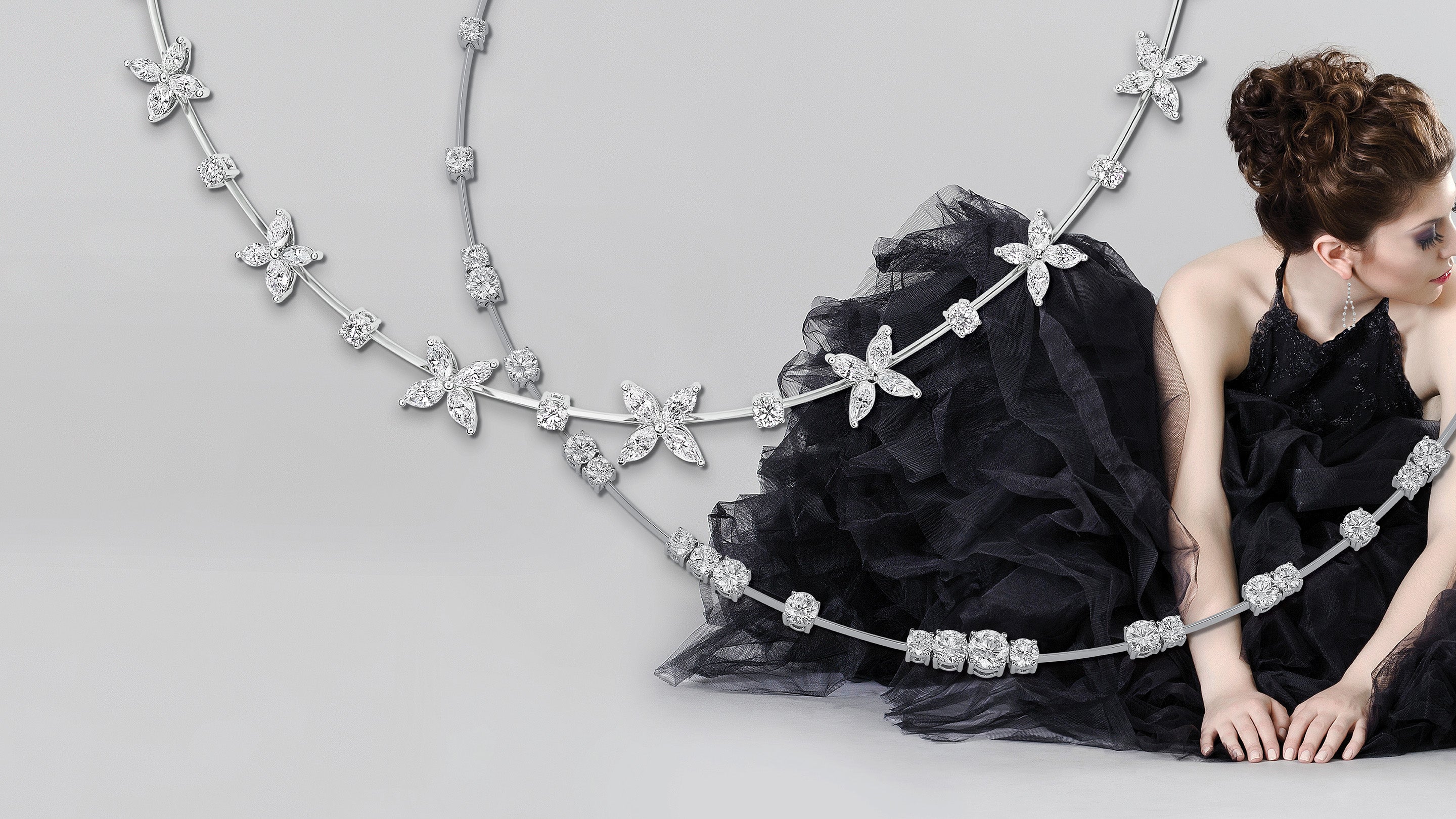 Diamond necklaces and woman in elegant black dress