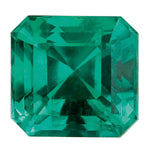 Faceted green gemstone on a white background