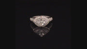 Video of rotating ring with diamonds on black background