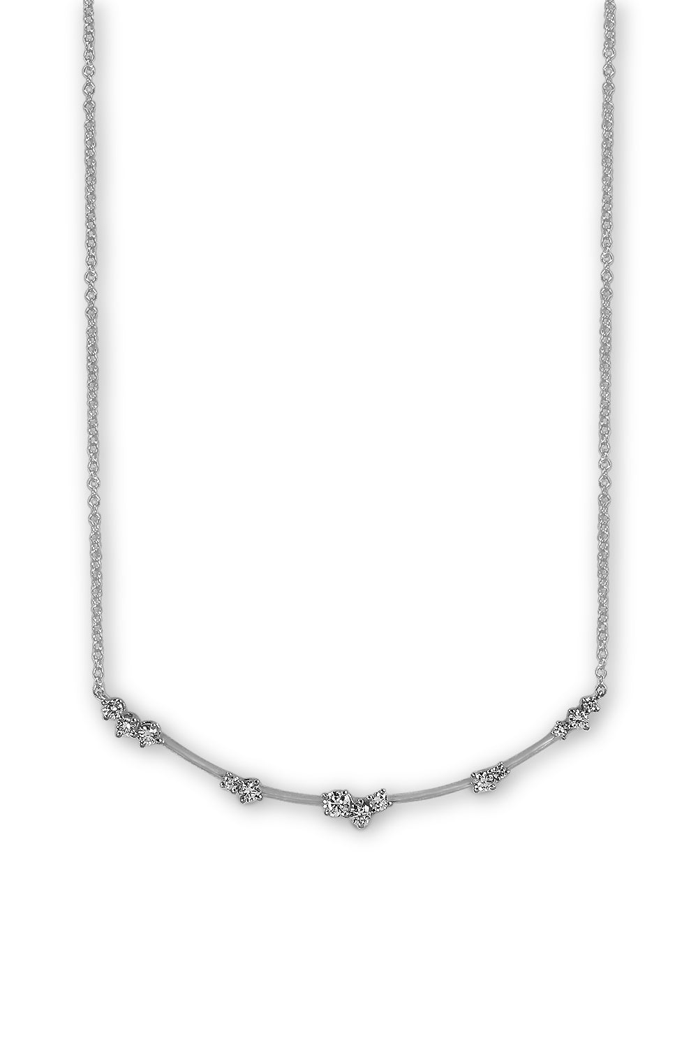 An 18K white gold necklace featuring a cluster of diamonds set along an arc on a white background.