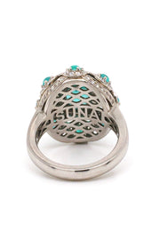 Back view of platinum ring with a faceted African paraiba, Brazilian cabochon paraibas, and diamonds on a white background