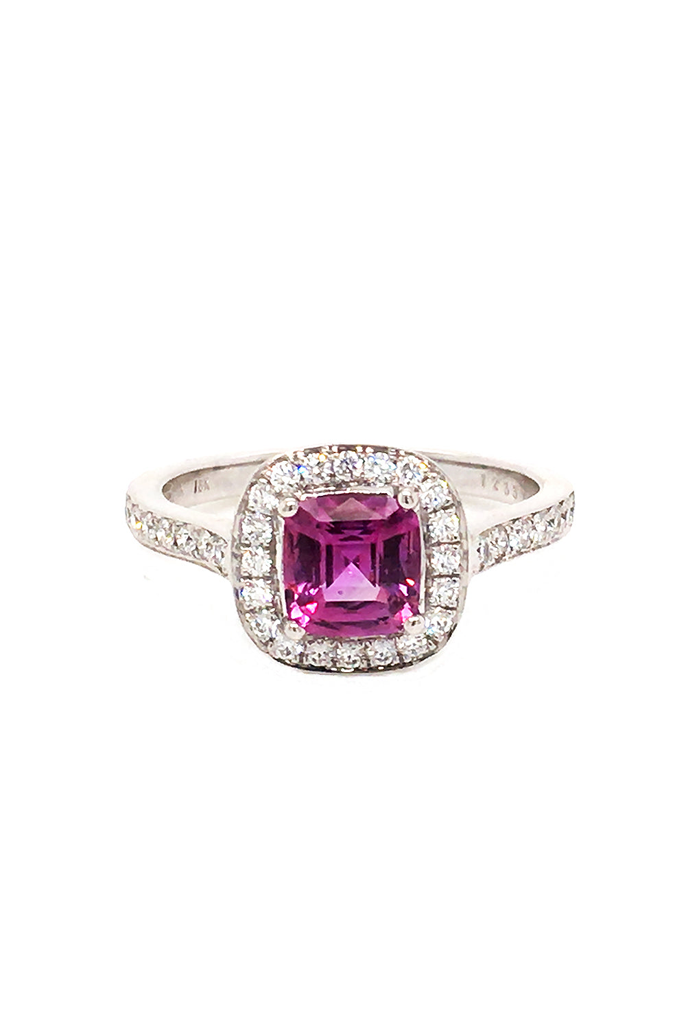 18K white gold ring with cushion-cut pink sapphire and round diamonds on white background