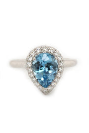 Platinum ring with aquamarine and  diamonds on white background