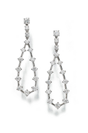 Platinum and diamond earrings featuring a pear- shape design on a white background