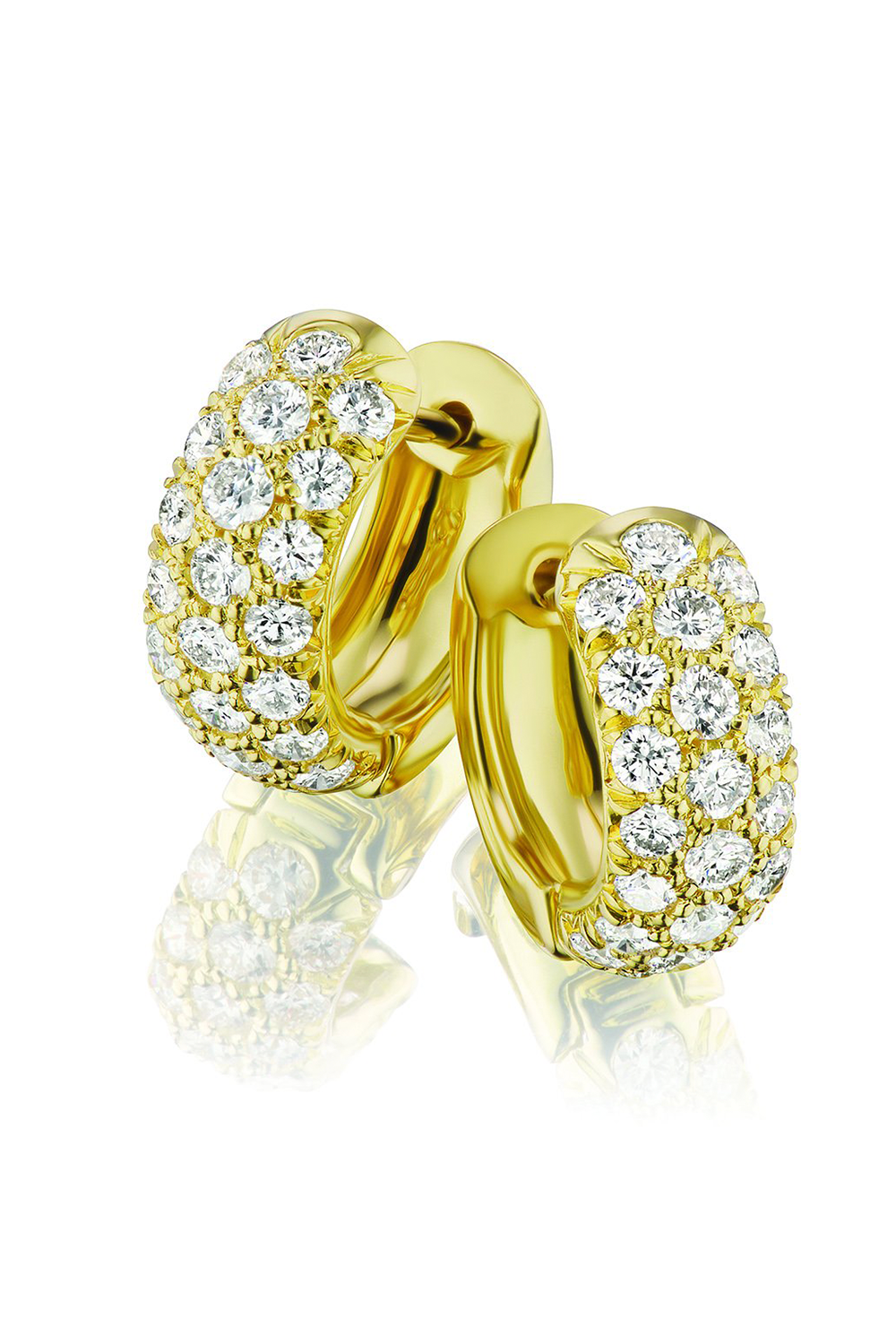18K yellow gold huggie earrings with diamonds on white background