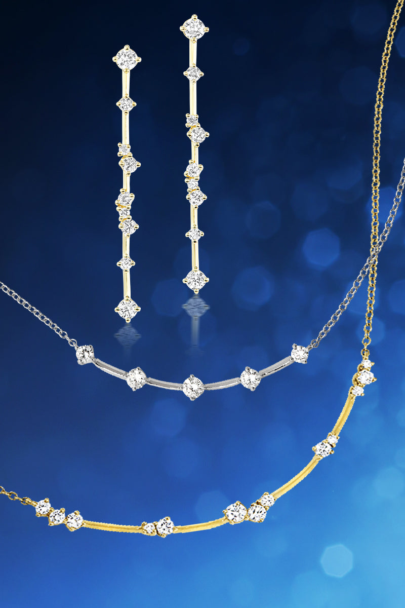Necklaces and earrings with diamond accents on a blue background