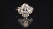 Video of rotating ring with diamonds on black background