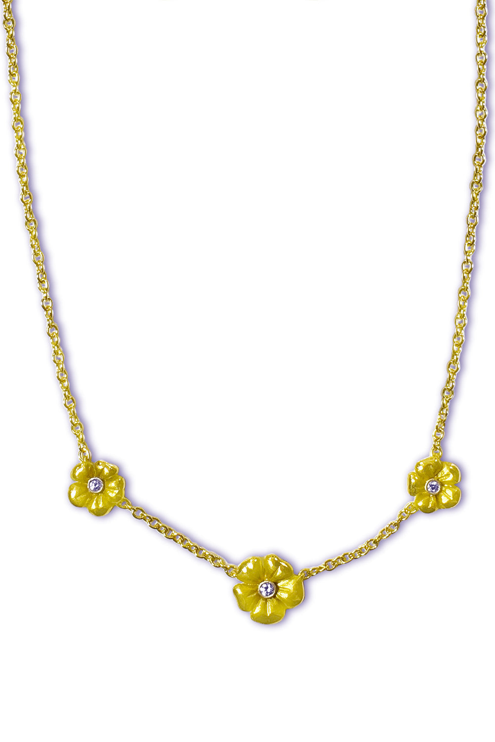 An 18KT yellow gold necklace with three flowers and one diamond each on a white background