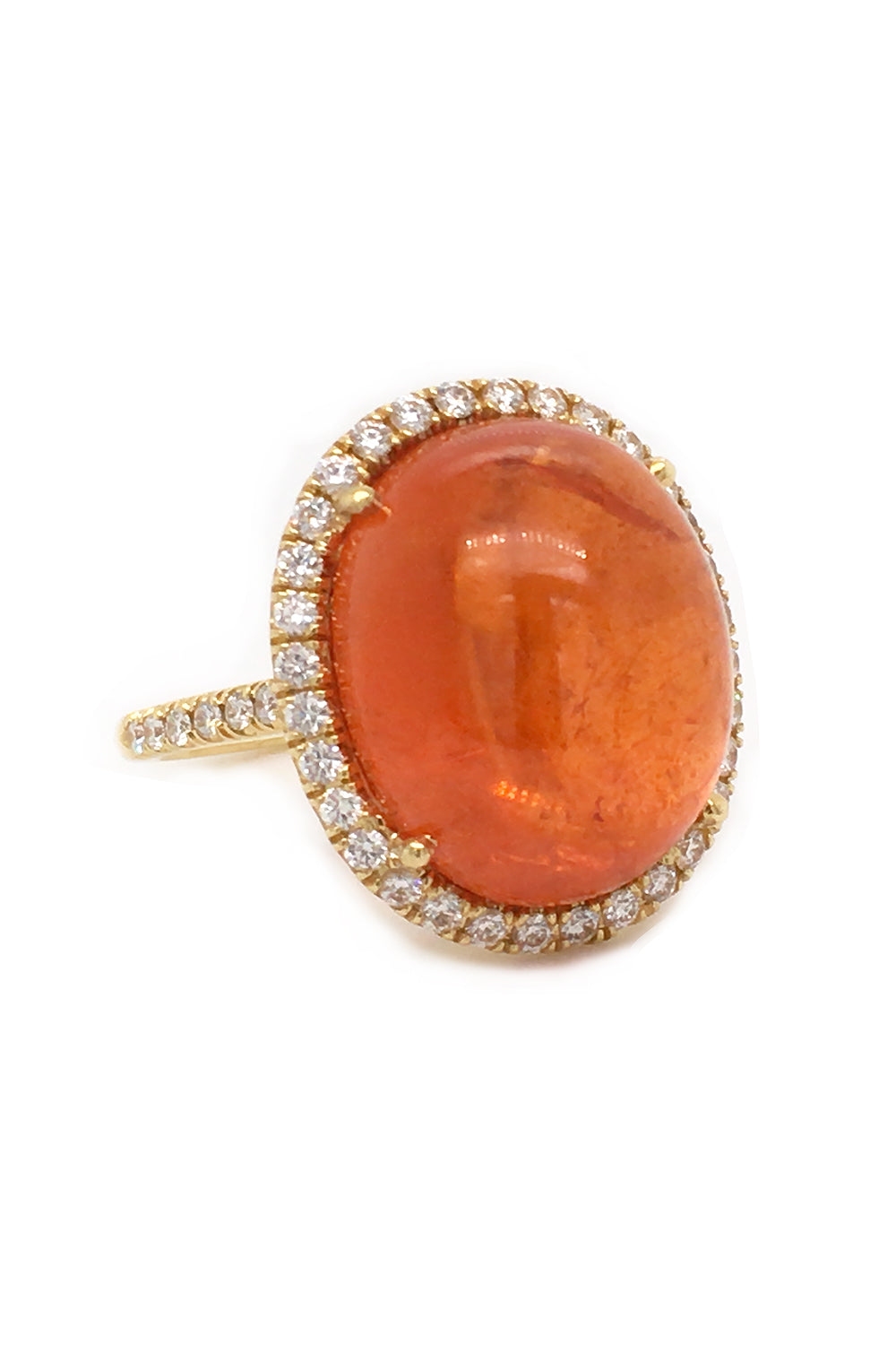 18K yellow gold ring with orange garnet and diamond halo on white background.
